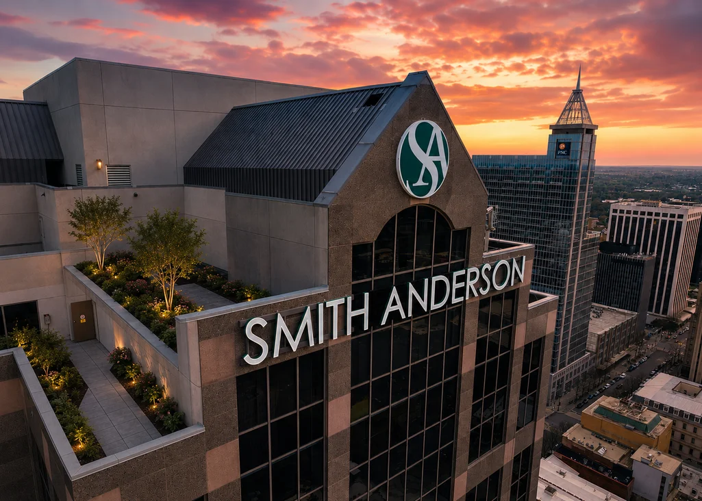 Smith Anderson signage atop building at sunset